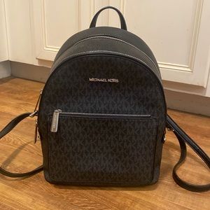 Gently used Michael Kors Black Backpack Adina